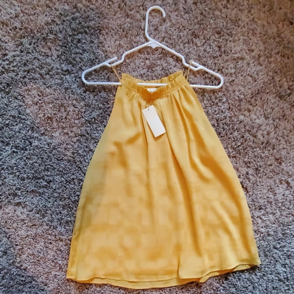 Yellow Sleeveless blouse